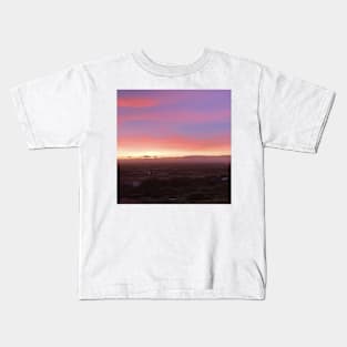 A pink sunset Kids T-Shirt